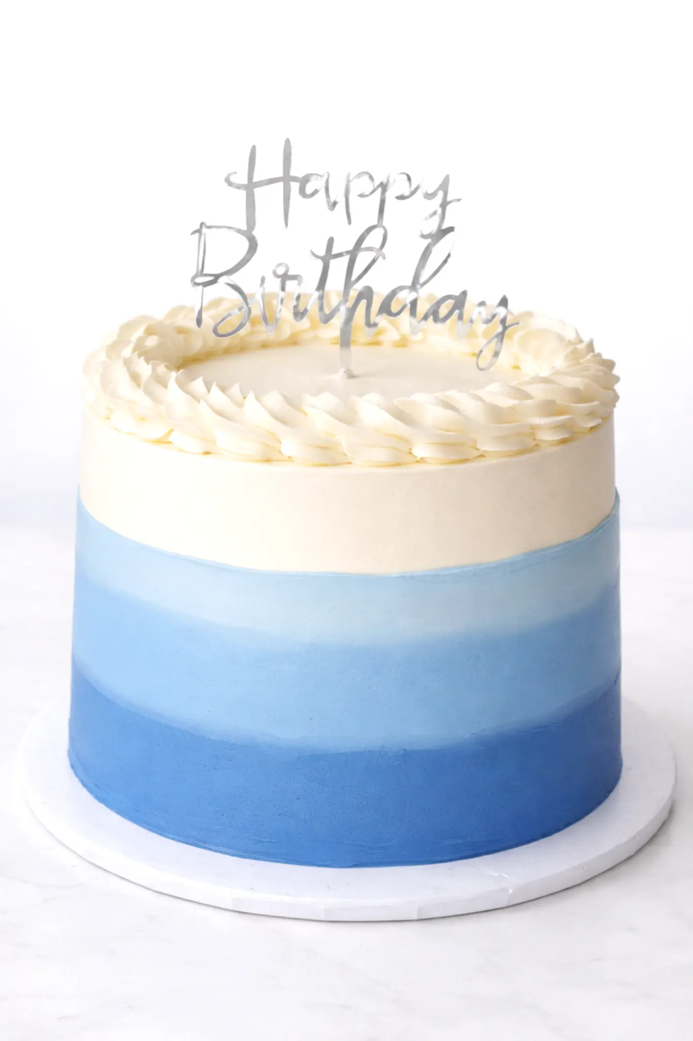 Express cake decorated with yellow flowers buttercream